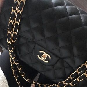 Authentic Chanel Class Jumbo black and gold lamb